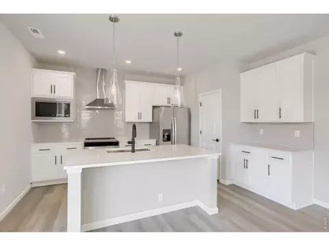 Kitchen - 678 Noola St, Windsor, CO 80550 photo 3 of 3