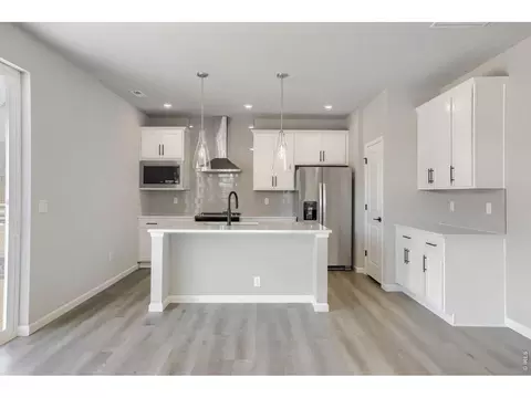 Kitchen - 678 Noola St, Windsor, CO 80550 photo 2 of 3