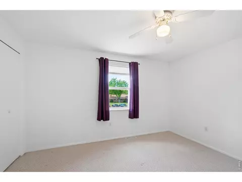 Bedroom - 707 E 3rd St #E-3, Windsor, CO 80550 photo 2 of 2
