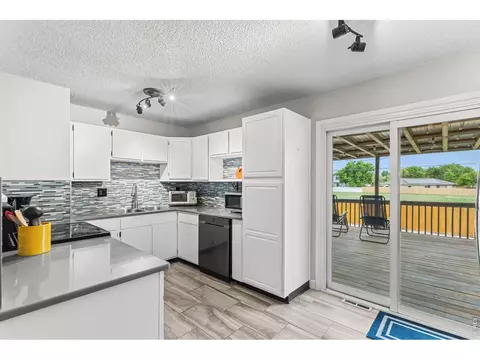 Kitchen - 717 10th St, Windsor, CO 80550 photo 5 of 7