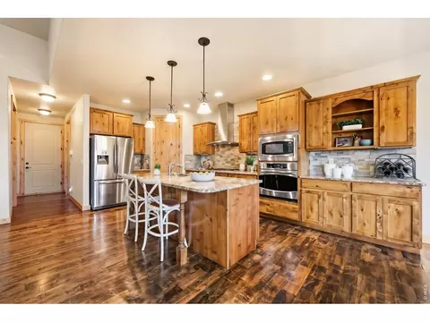 Kitchen - 5506 Evangeline Dr, Windsor, CO 80550 photo 3 of 6