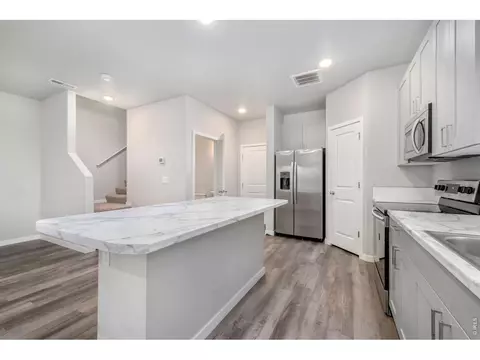 Kitchen - 701 Applegate Trl #D-1, Ault, CO 80610 photo 5 of 5