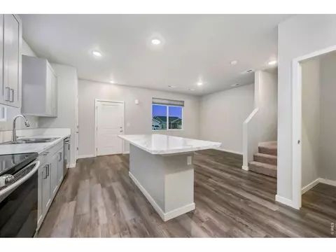 Kitchen - 701 Applegate Trl #D-1, Ault, CO 80610 photo 3 of 5