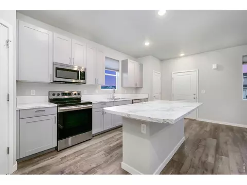 Kitchen - 701 Applegate Trl #D-1, Ault, CO 80610 photo 2 of 5