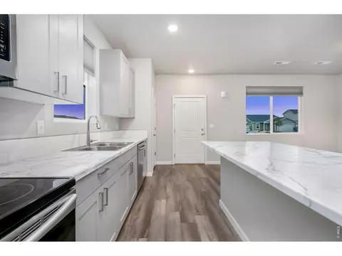 Kitchen - 701 Applegate Trl #D-1, Ault, CO 80610 photo 4 of 5