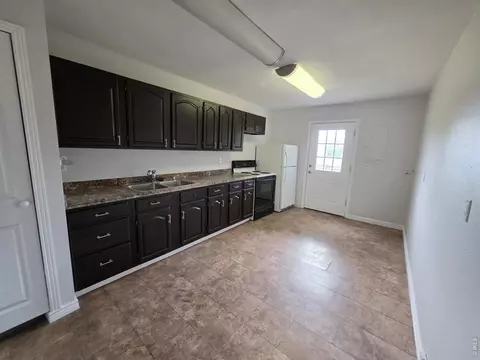 Kitchen - 213 Main St, Wiggins, CO 80654 photo 1 of 2