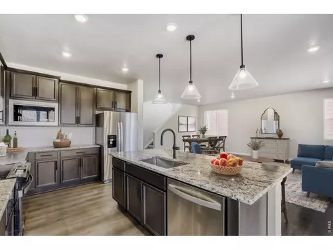 Kitchen - 662 Noola St, Windsor, CO 80550 photo 3 of 4