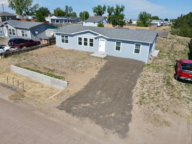114 High St, Wiggins, CO 80654