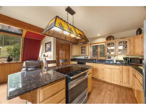 Kitchen - 12191 Tecumseh Trl, Conifer, CO 80433 photo 4 of 7