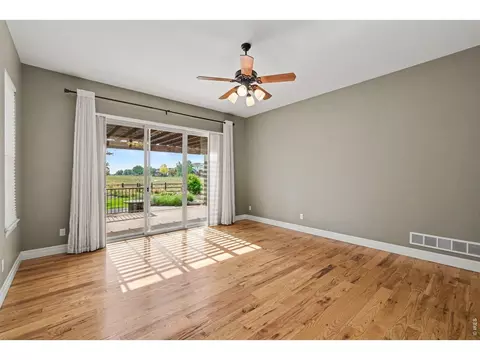 Living - 5661 Mid Pointe Dr, Windsor, CO 80550 photo 6 of 6
