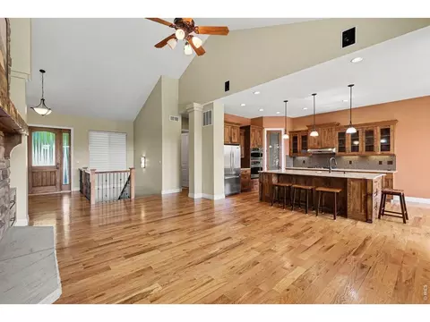 Living - 5661 Mid Pointe Dr, Windsor, CO 80550 photo 3 of 6