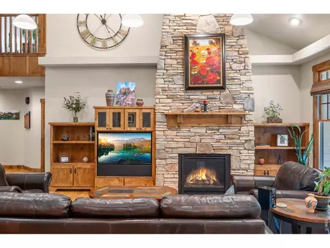 Living - 6854 Pumpkin Ridge Dr, Windsor, CO 80550 photo 4 of 5