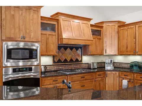 Kitchen - 6854 Pumpkin Ridge Dr, Windsor, CO 80550 photo 2 of 6