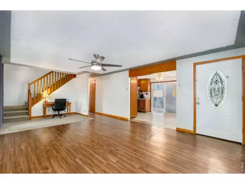 Living - 5200 Dover St, Arvada, CO 80002 photo 2 of 2