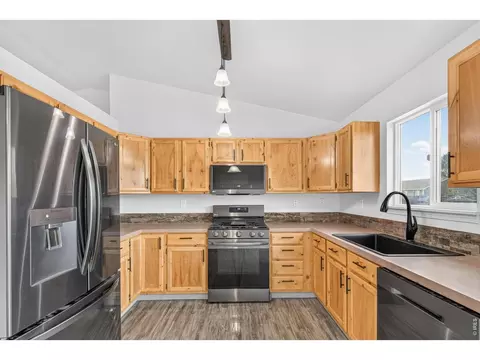 Kitchen - 408 Suzann St, Wiggins, CO 80654 photo 2 of 4