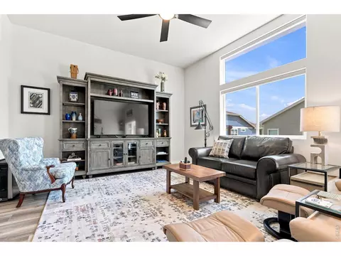 Living - 867 Sunlight Peak Dr, Severance, CO 80550 photo 2 of 6
