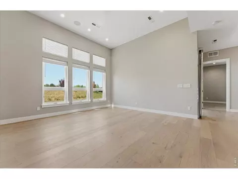Living - 1768 Barefoot Dr, Windsor, CO 80550 photo 8 of 10