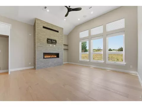 Living - 1768 Barefoot Dr, Windsor, CO 80550 photo 7 of 10