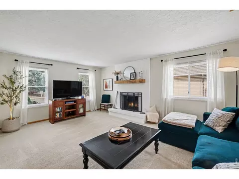 Living - 717 Shipman Mountain Ct, Windsor, CO 80550 photo 2 of 2