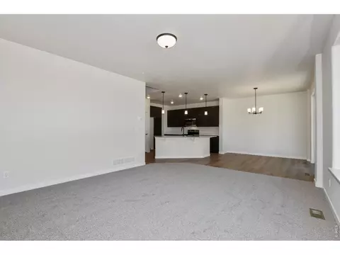 Living - 1144 Bitterroot Ct, Johnstown, CO 80534 photo 2 of 6