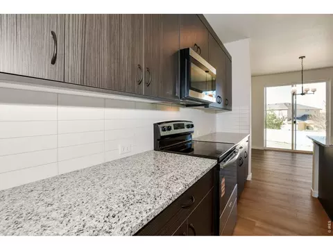 Kitchen - 1144 Bitterroot Ct, Johnstown, CO 80534 photo 5 of 6