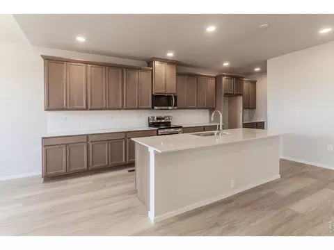 Kitchen - 734 Trumpet Ct, Windsor, CO 80550 photo 4 of 9
