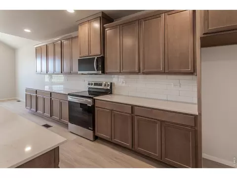 Kitchen - 734 Trumpet Ct, Windsor, CO 80550 photo 9 of 9