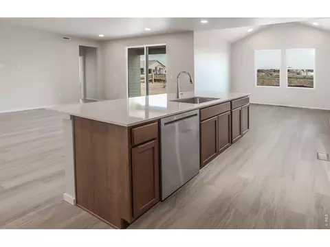 Kitchen - 734 Trumpet Ct, Windsor, CO 80550 photo 8 of 9