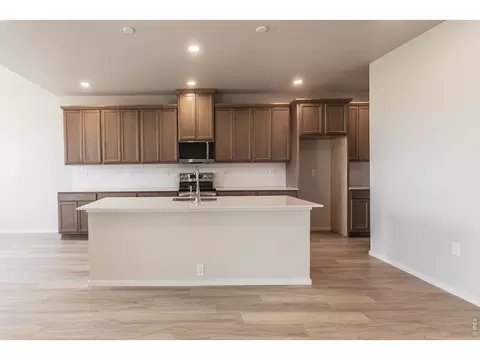 Kitchen - 734 Trumpet Ct, Windsor, CO 80550 photo 3 of 9