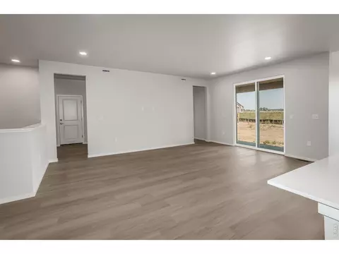 Living - 734 Trumpet Ct, Windsor, CO 80550 photo 2 of 2