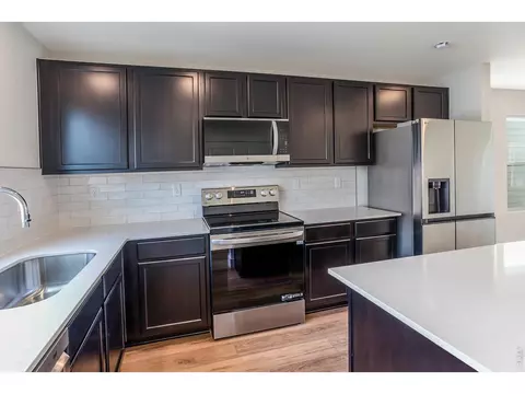 Kitchen - 955 Trumpet Ln, Windsor, CO 80550 photo 3 of 7
