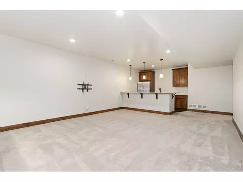 Living - 5928 Clarence Dr, Windsor, CO 80550 photo 6 of 7