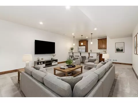 Living - 5928 Clarence Dr, Windsor, CO 80550 photo 5 of 7