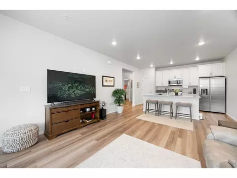Living - 2102 Setting Sun Dr #4, Windsor, CO 80550 photo 2 of 2