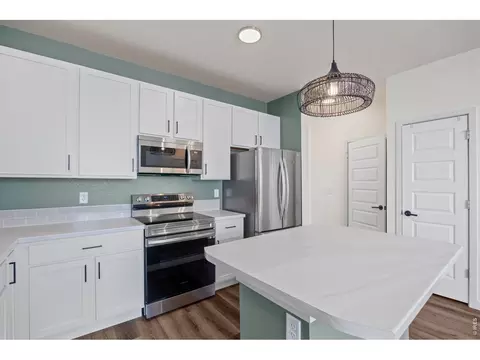 Kitchen - 620 Apache Trl #B-3, Ault, CO 80610 photo 4 of 7