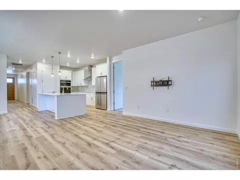 Living - 1456 Mullers Dr, Windsor, CO 80550 photo 2 of 2