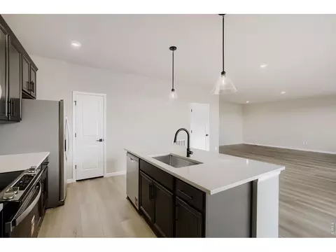 Kitchen - 677 Noola St, Windsor, CO 80550 photo 2 of 4