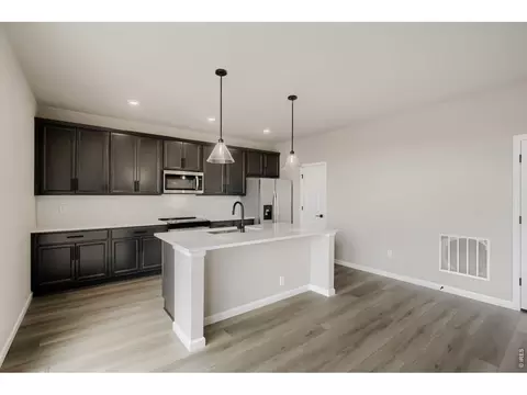 Kitchen - 677 Noola St, Windsor, CO 80550 photo 3 of 4