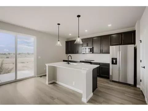 Kitchen - 677 Noola St, Windsor, CO 80550 photo 4 of 4