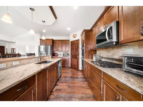 Kitchen - 8213 Cherry Blossom Dr, Windsor, CO 80550 photo 3 of 4