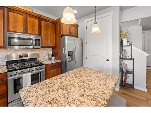Kitchen - 560 Cimarron Dr, Ault, CO 80610 photo 3 of 3