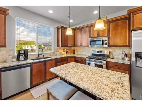 Kitchen - 560 Cimarron Dr, Ault, CO 80610 photo 2 of 3