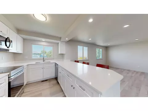Kitchen - 113 Madison Dr, Bennett, CO 80102 photo 2 of 3