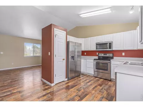 Kitchen - 320 E Lilac St, Milliken, CO 80543 photo 2 of 3