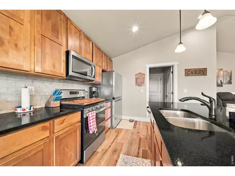 Kitchen - 121 Seventh Ave, Wiggins, CO 80654 photo 4 of 5