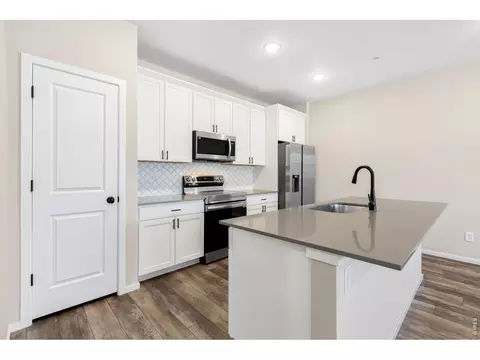 Kitchen - 2102 Setting Sun Dr #2, Windsor, CO 80550 photo 2 of 3