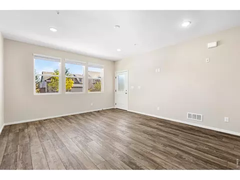 Living - 2102 Setting Sun Dr #2, Windsor, CO 80550 photo 3 of 4