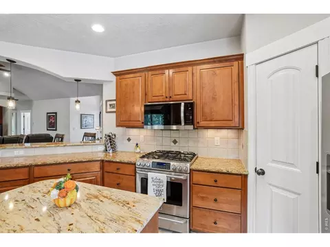 Kitchen - 485 Wind River Dr, Windsor, CO 80550 photo 4 of 5