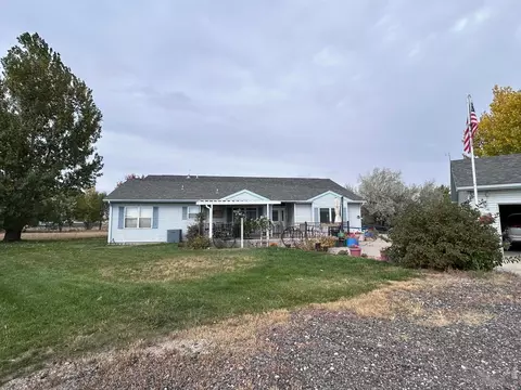 Exterior - 717 3rd Ave, Wiggins, CO 80654 photo 9 of 12
