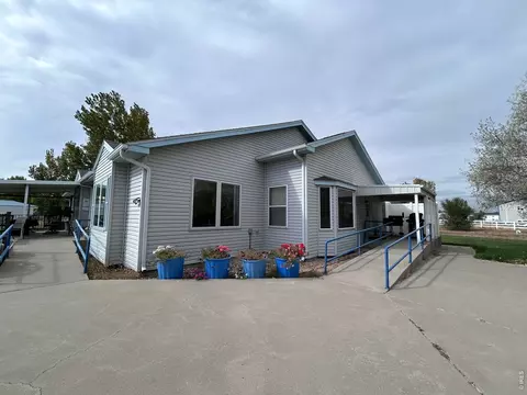 Exterior - 717 3rd Ave, Wiggins, CO 80654 photo 2 of 12